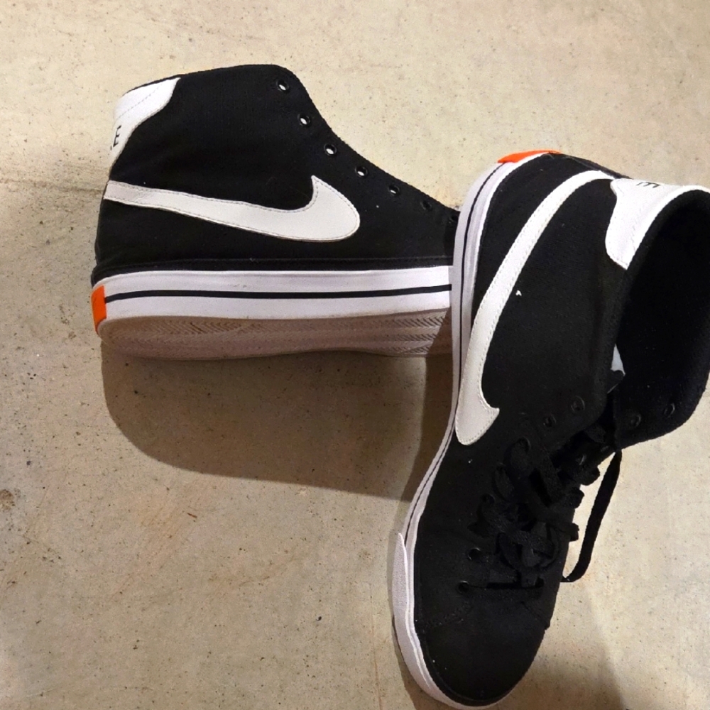 Nike Black and White Sneakers with Orange Accents